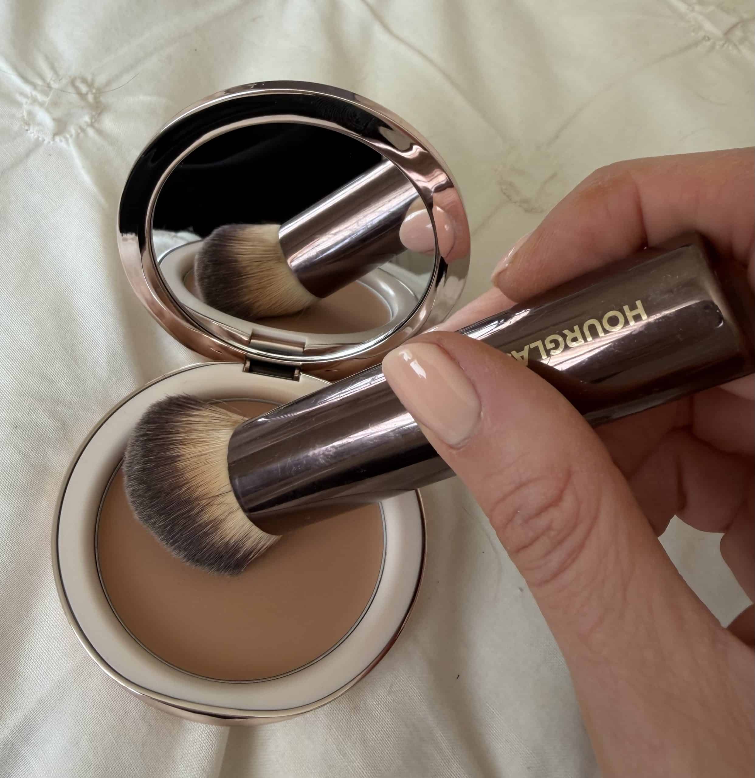 Laura Mercier tinted balm with a foundation brush