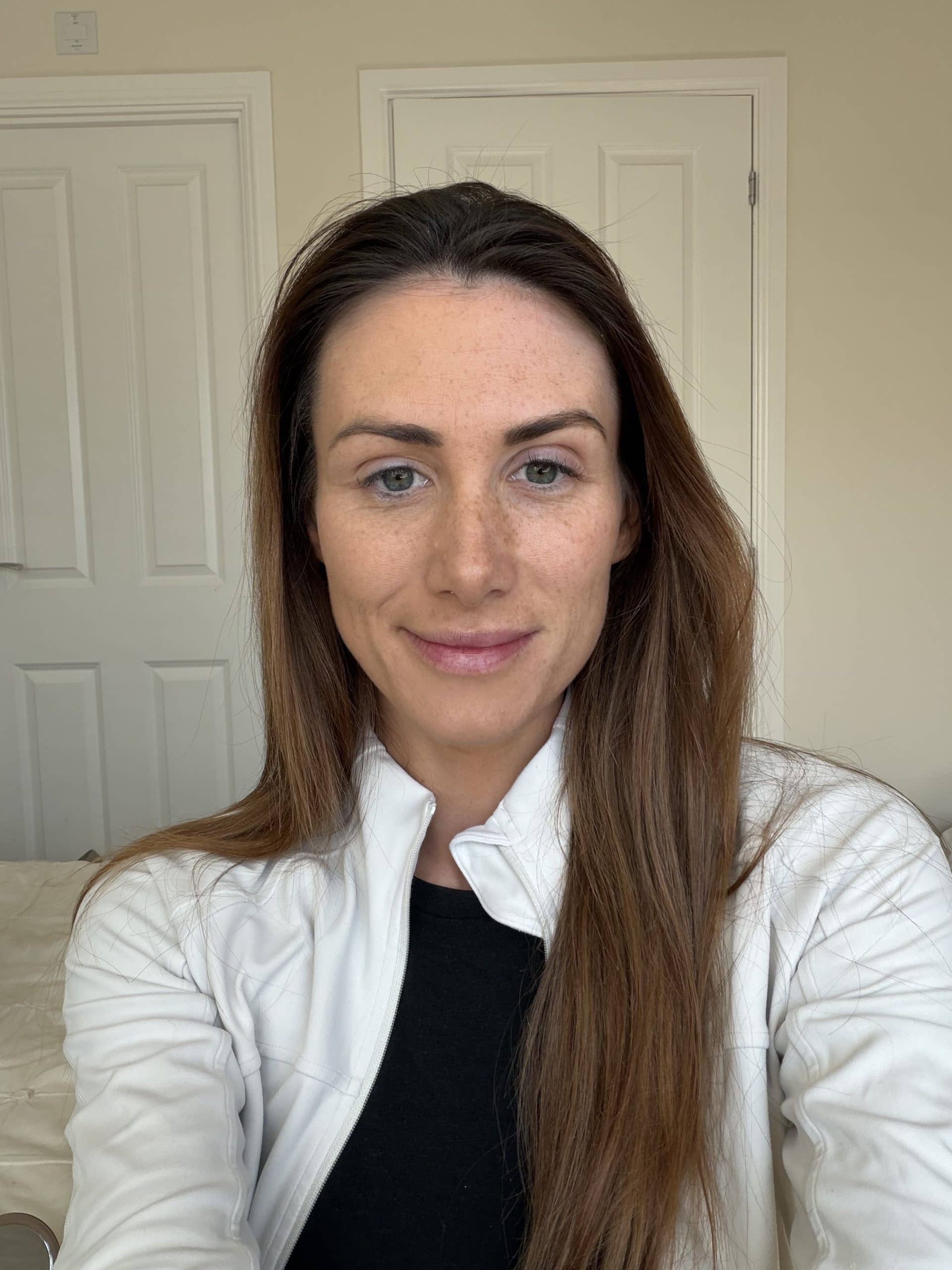 Laura Mercier tinted blur balm on half of my face